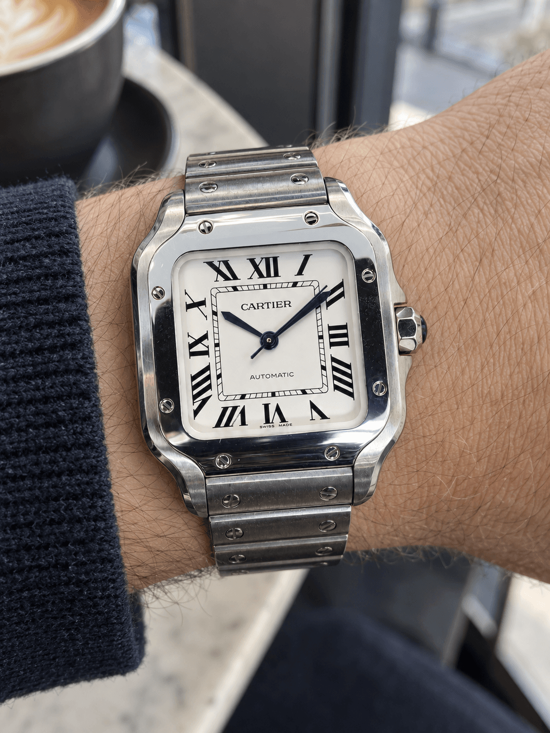 Cartier Santos on a wrist, an illustrative photograph